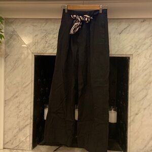 Women’s MANGO wide leg black slacks with belt. Size 2